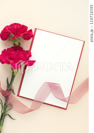 Red carnation and card mockup 119718395