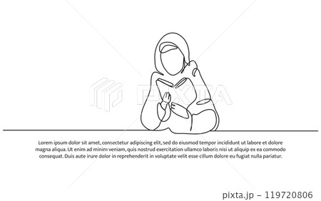 a young girl read the Quran earnestly 119720806