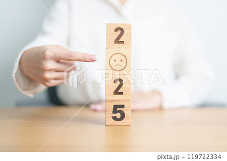 Happy New Year 2025 with Sad face block. Satisfaction, feedback, Review, mental health, eco sustainable and bad year concept Happy New Year 2025 with Sad face block. Satisfaction, feedback, Review, mental health, eco sustainable and bad year concept 119722334