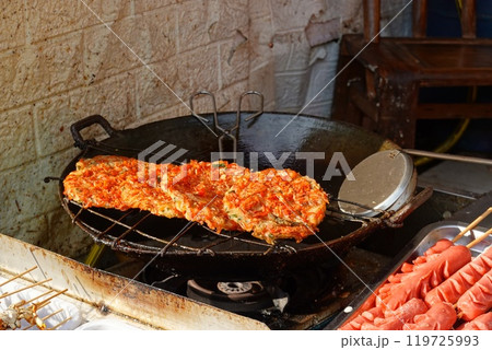 Meatballs and Hot dog fried street food in China Meatballs and Hot dog fried street food in China 119725993