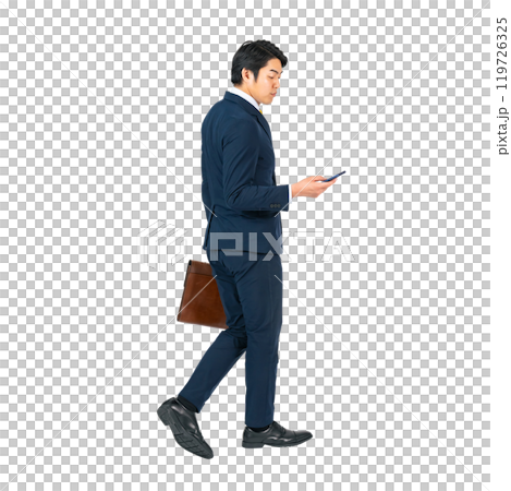 A young male business person walking while looking at his smartphone. A transparent full-body photo PNG precisely cut by hand 119726325