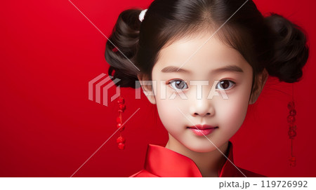 Portrait of smiling asian girl child with long white hair red background. 119726992