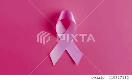 Pink ribbon on a pink background as a symbol of support for the fight against cancer with space for text Pink ribbon on a pink background as a symbol of support for the fight against cancer with space for text 119727116