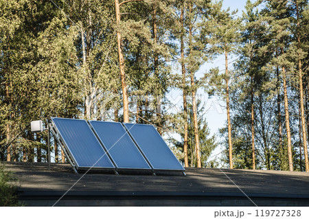 Solar Electric Panel on the Roof of a House. Solar Energy for Private Homes Solar Electric Panel on the Roof of a House. Solar Energy for Private Homes 119727328