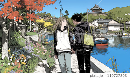 旅先で紅葉観光をしている若いカップル
