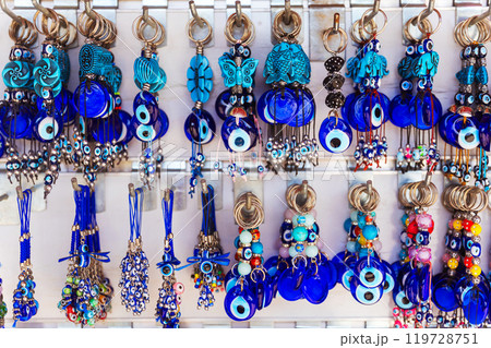 numerous distinct types of evil eyes displayed on the wall numerous distinct types of evil eyes displayed on the wall 119728751