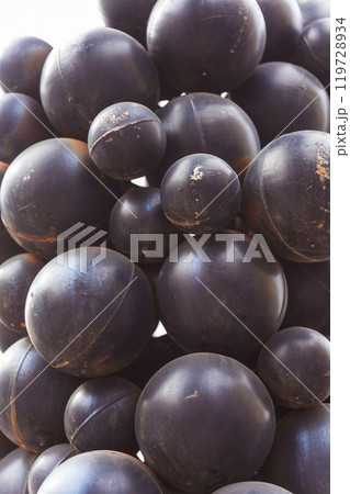 Artificial plastic berries of clusters of black grapes close -up Artificial plastic berries of clusters of black grapes close -up 119728934