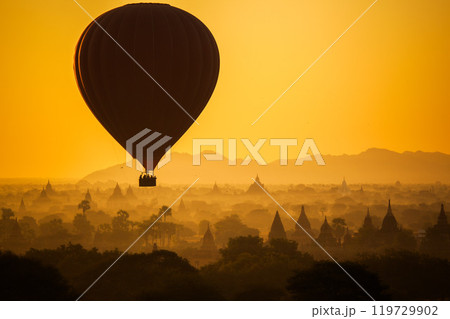 Balloon over plain of Bagan in misty morning, Myanmar 119729902