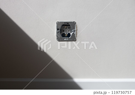 new electrical socket with socket box and wires for outlet or switch installation on wall. new electrical socket with socket box and wires for outlet or switch installation on wall. 119730757