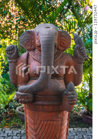 statue of Buddhist god Ganesha in the form of an elephant on a pagoda in Vietnam in Asia statue of Buddhist god Ganesha in the form of an elephant on a pagoda in Vietnam in Asia 119732447