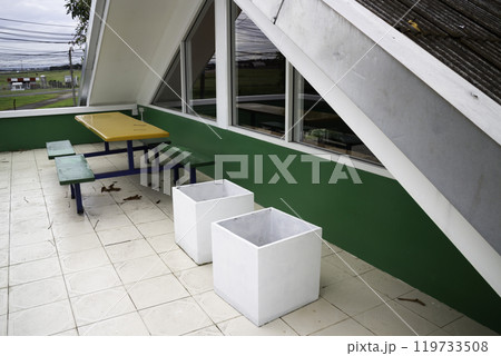 Vintage outdoor coffee table in cafe terrace Vintage outdoor coffee table in cafe terrace 119733508