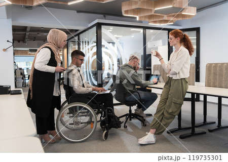 Young group of business people brainstorming together in a startup space, discussing business projects, investments, and solving challenges. Young group of business people brainstorming together in a startup space, discussing business projects, investments, and solving challenges. 119735301