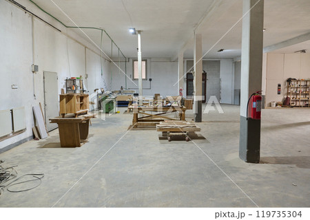 Interior of Wood Processing Industry Featuring CNC Cutting Machines and Wood Processing Equipment 119735304