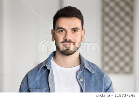 Positive handsome young Middle Eastern entrepreneur man in casual cloth 119737248