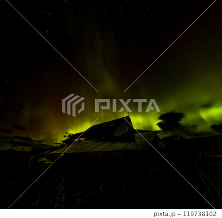 The Aurora Borealis, the northern lights, showing up above bungalow in County Donegal, Ireland The Aurora Borealis, the northern lights, showing up above bungalow in County Donegal, Ireland 119738102