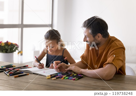 Happy dad and preschool daughter girl drawing doodles 119738248