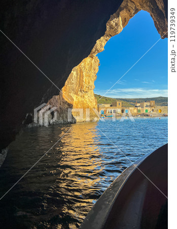 View from the boat  to the cave on the coast  119739349