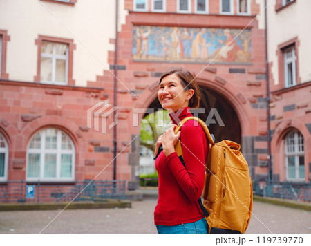 woman walks through old town of Frankfurt 119739770