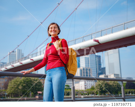 Tourist woman explores modern Frankfurt, 119739771