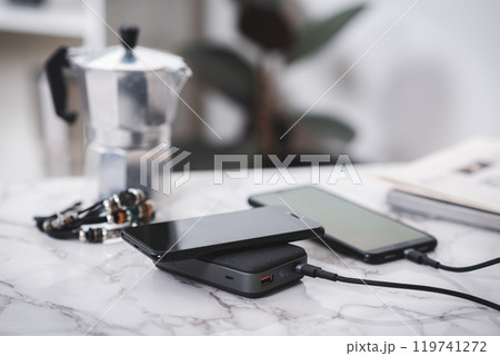 Charging the smartphone Charging the smartphone 119741272