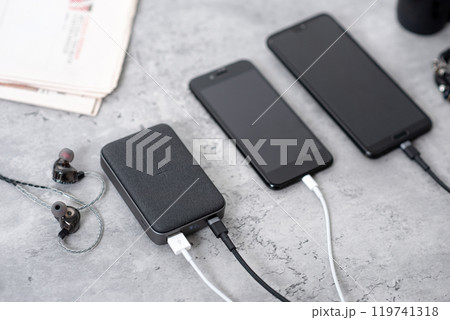 Charging the smartphone 119741318