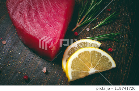 fresh red tuna fillet, for steak, raw, top view, on a cutting board, no people, 119741720