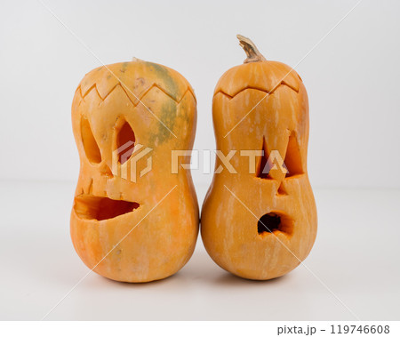 Two Jack-o-lantern on a white background. Halloween decoration. Two Jack-o-lantern on a white background. Halloween decoration. 119746608