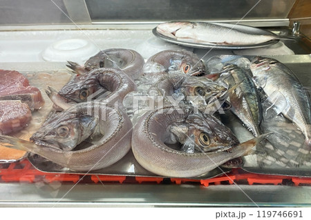 Raw fish in a store window, fresh seafood Raw fish in a store window, fresh seafood 119746691