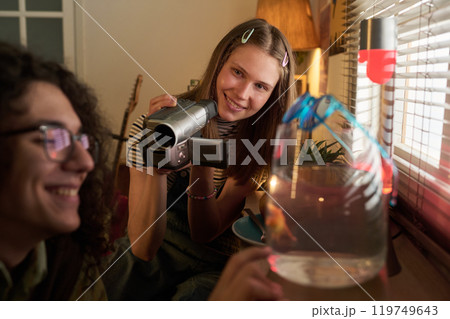 Recording Home Footage During an Indoor Activity Recording Home Footage During an Indoor Activity 119749643