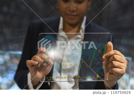businesswoman using tablet digital strategy analysis investment on screen. broker analysis trading stock graph market management. 119750929
