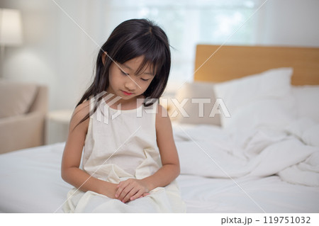 child is depressed due to family problems. little girl sits alone in her bedroom. Paint from being bitten. Kid girl has pain, is not well, and has a fever. child is depressed due to family problems. little girl sits alone in her bedroom. Paint from being bitten. Kid girl has pain, is not well, and has a fever. 119751032