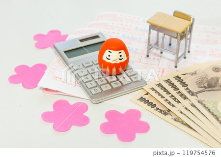 教育費 お金のイメージ ダルマ、計算機、銀行の振込用紙、学校机とイス、一万円札 教育費 お金のイメージ ダルマ、計算機、銀行の振込用紙、学校机とイス、一万円札 119754576