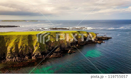 A Beautiful Coastal Landscape Featuring Rocks and Glimmering Water, Capturing Natures Splendor 119755057