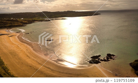 Fintra Bay in Donegal Ireland - Peaceful and Serene Beach Scene Featuring Rolling Hills and Fintra Bay in Donegal Ireland - Peaceful and Serene Beach Scene Featuring Rolling Hills and 119755109