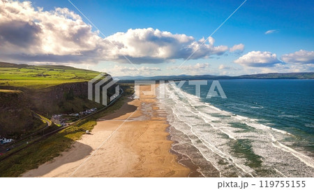 Flight along the west coast of Northern Ireland at Downhill Beach on a sunny day 119755155