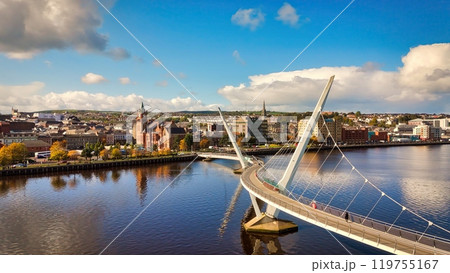 Peace Bridge over River Foyle in the City of Derry aka Londonderry in Northern Ireland aerial view 119755167