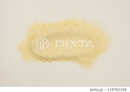 Smear of uncooked raw durum wheat semolina top view. 119762266