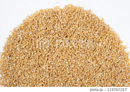 Wheat Cereal Texture Close-up Top View on White Background. Wheat Cereal Texture Close-up Top View on White Background. 119762267