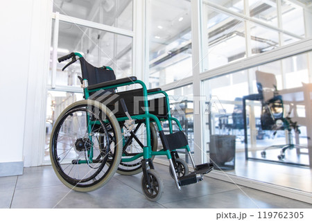 Picture of a wheelchair in the clinic corridor 119762305
