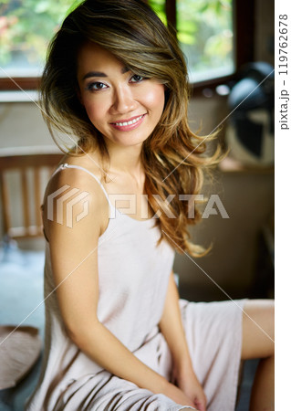 Beautiful young woman posing in craft workshop 119762678