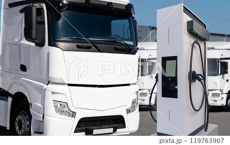 Electric vehicles charging station on a background of a trucks. Concept. Electric vehicles charging station on a background of a trucks. Concept. 119763907