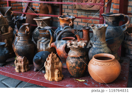 Antique clay pots, vases and jugs in pottery workshop in Vietnam in Asia 119764831