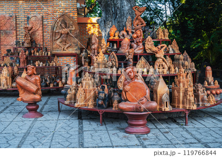 Buddhist religious clay figurines and pottery in souvenir shop on Po Nagar Cham Towers in Nha Trang, Vietnam 119766844