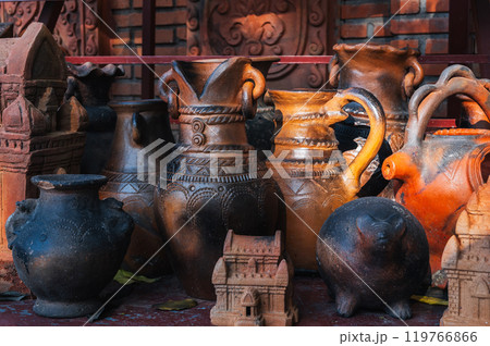 Antique clay pots, vases and jugs in pottery workshop in Vietnam in Asia 119766866