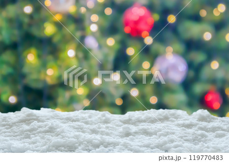 Empty white snow with blur Christmas tree with bokeh light background 119770483