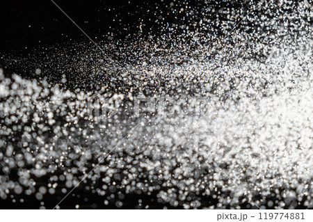 Abstract black and white background of pouring flour, space for text Abstract black and white background of pouring flour, space for text 119774881