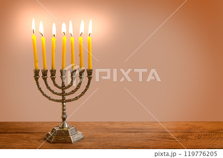 Hanukkah Menorah with burning candles 119776205