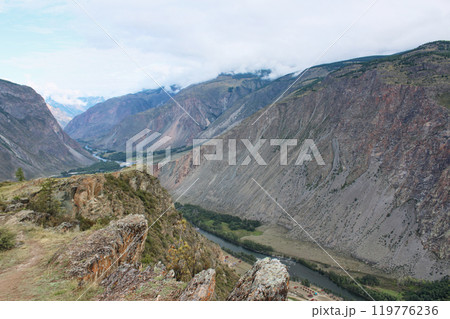 View from Katu-Yaryk pass to Chulyshman valley. High mountains, a river below. Altai Republic, Russia. Nature landmark 119776236