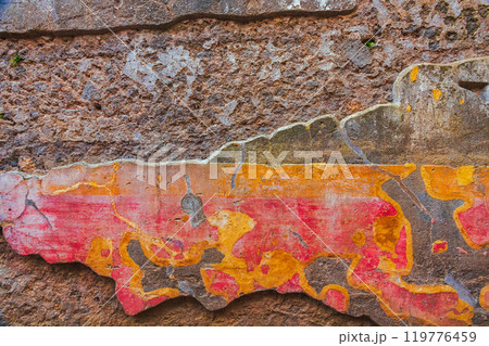 A Vibrant and Textured Wall Surface Featuring Colorful and Intricate Patterns and Designs of Pompei 119776459