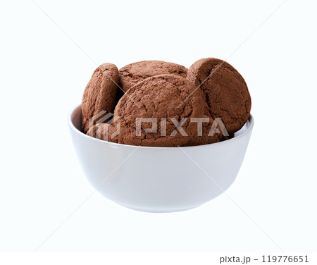 Chocolate cookies in a ceramic bowl isolated on white background. Chocolate cookies in a ceramic bowl isolated on white background. 119776651